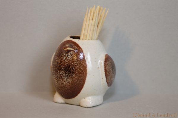 pingouin marron et blanc