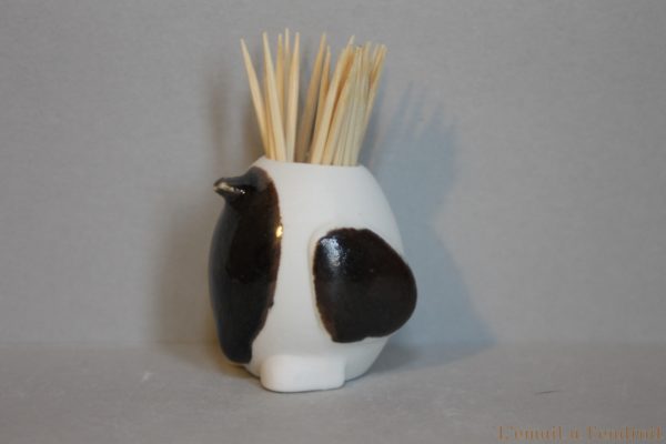 pingouin marron et blanc